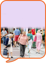 two people walking in the street