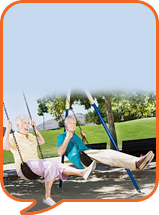 two people on swings