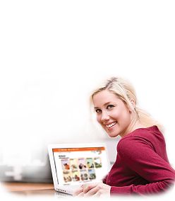 a smiling young woman with her laptop