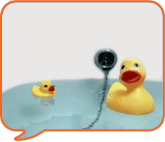 a plastic duck in a bath