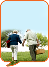 couple walking in a field
